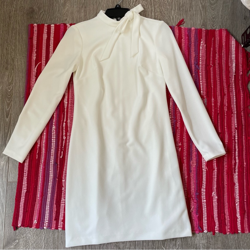 White, long sleeve, zipper back, neck tie design, SIZE 2, Calvin Klein,stretchy.